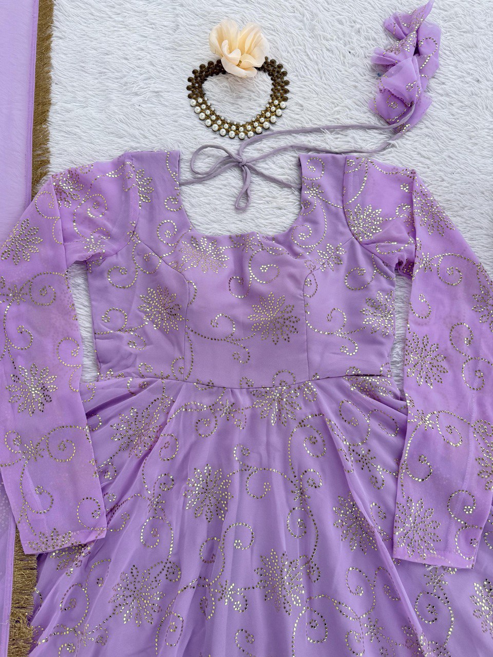 Trendy Lavender Color Georgette Foil Work Gown