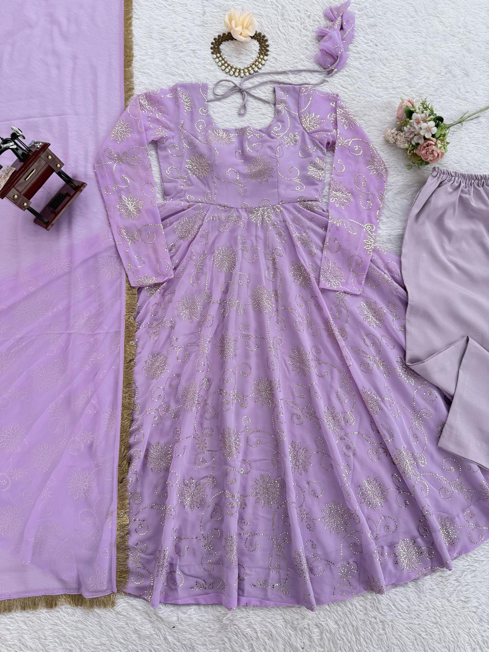 Trendy Lavender Color Georgette Foil Work Gown
