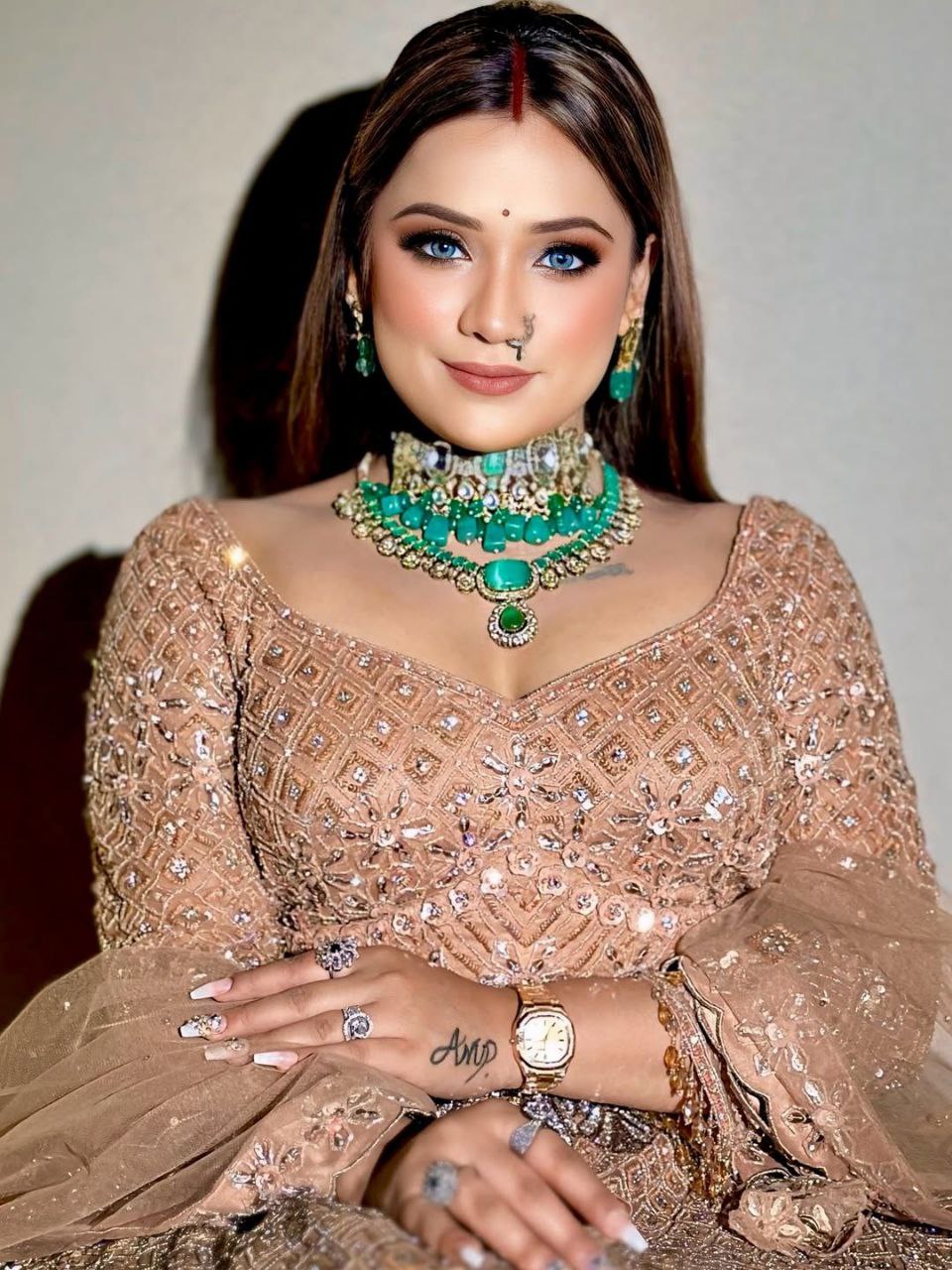 Wedding Collection Beige Color Net Heavy Embroidery Work Lehenga Choli