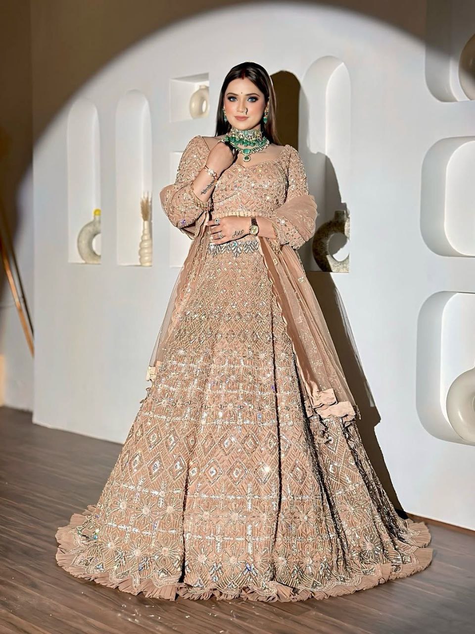 Wedding Collection Beige Color Net Heavy Embroidery Work Lehenga Choli