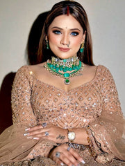Wedding Collection Beige Color Net Heavy Embroidery Work Lehenga Choli
