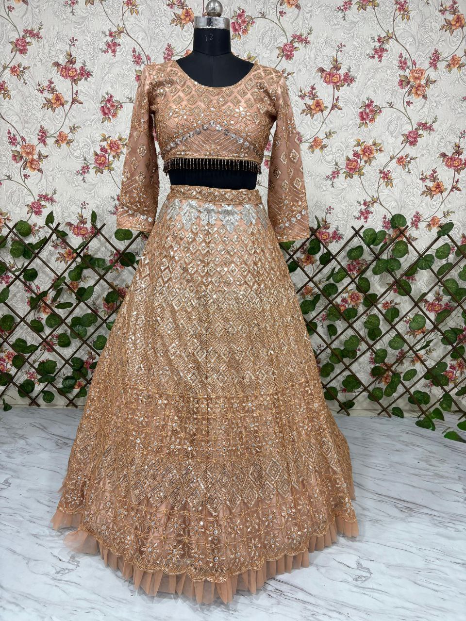 Wedding Collection Beige Color Net Heavy Embroidery Work Lehenga Choli
