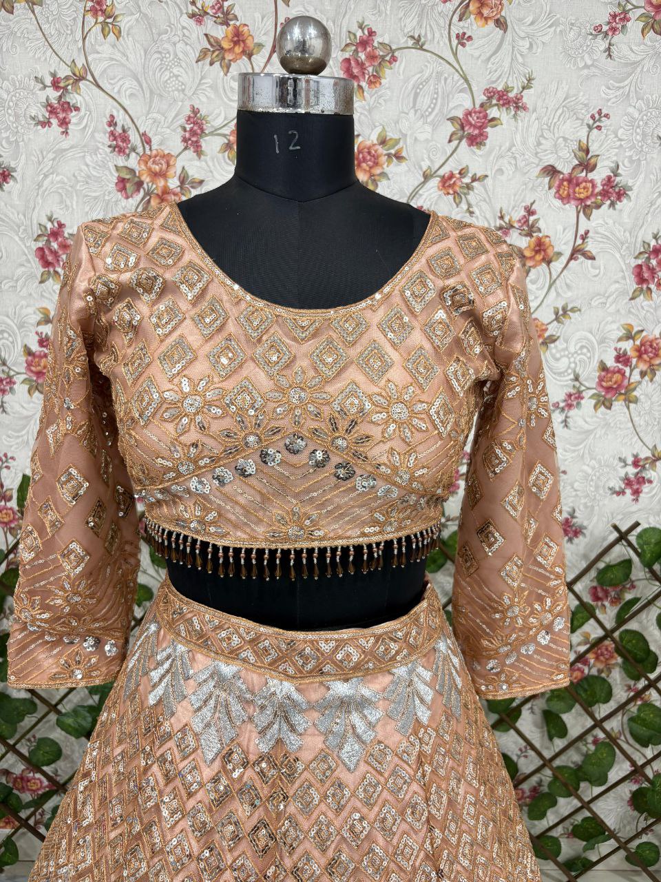 Wedding Collection Beige Color Net Heavy Embroidery Work Lehenga Choli