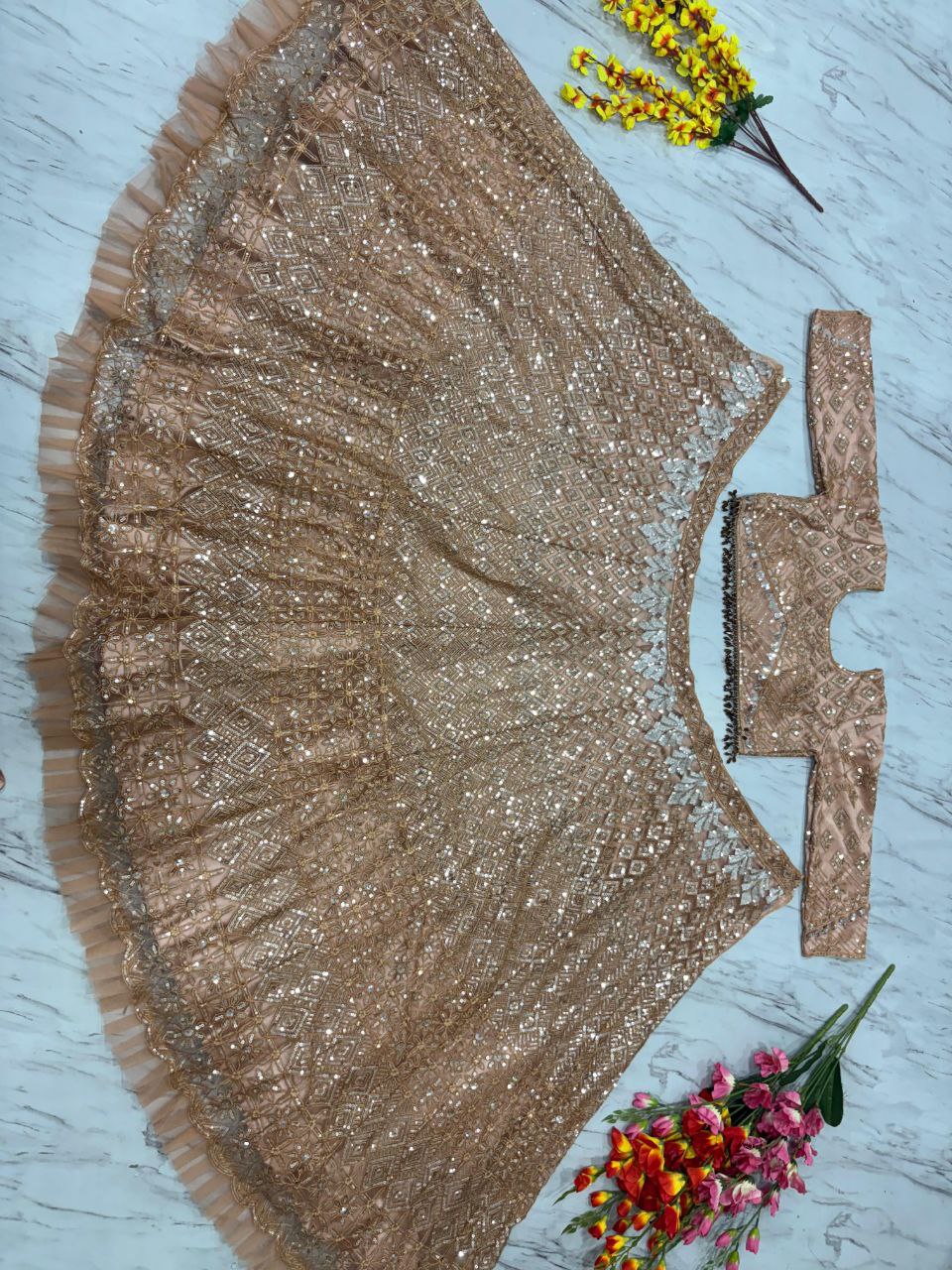 Wedding Collection Beige Color Net Heavy Embroidery Work Lehenga Choli