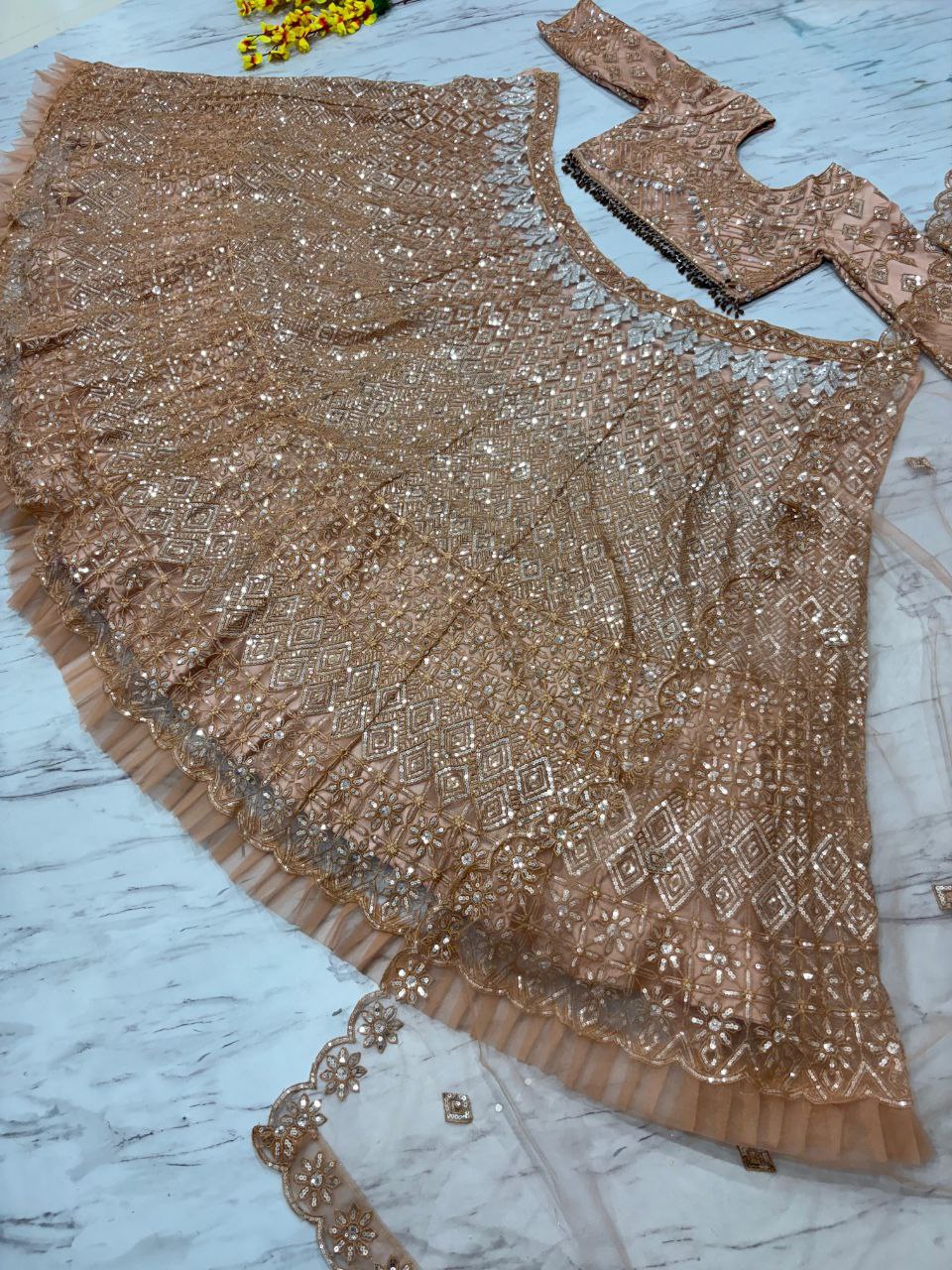 Wedding Collection Beige Color Net Heavy Embroidery Work Lehenga Choli