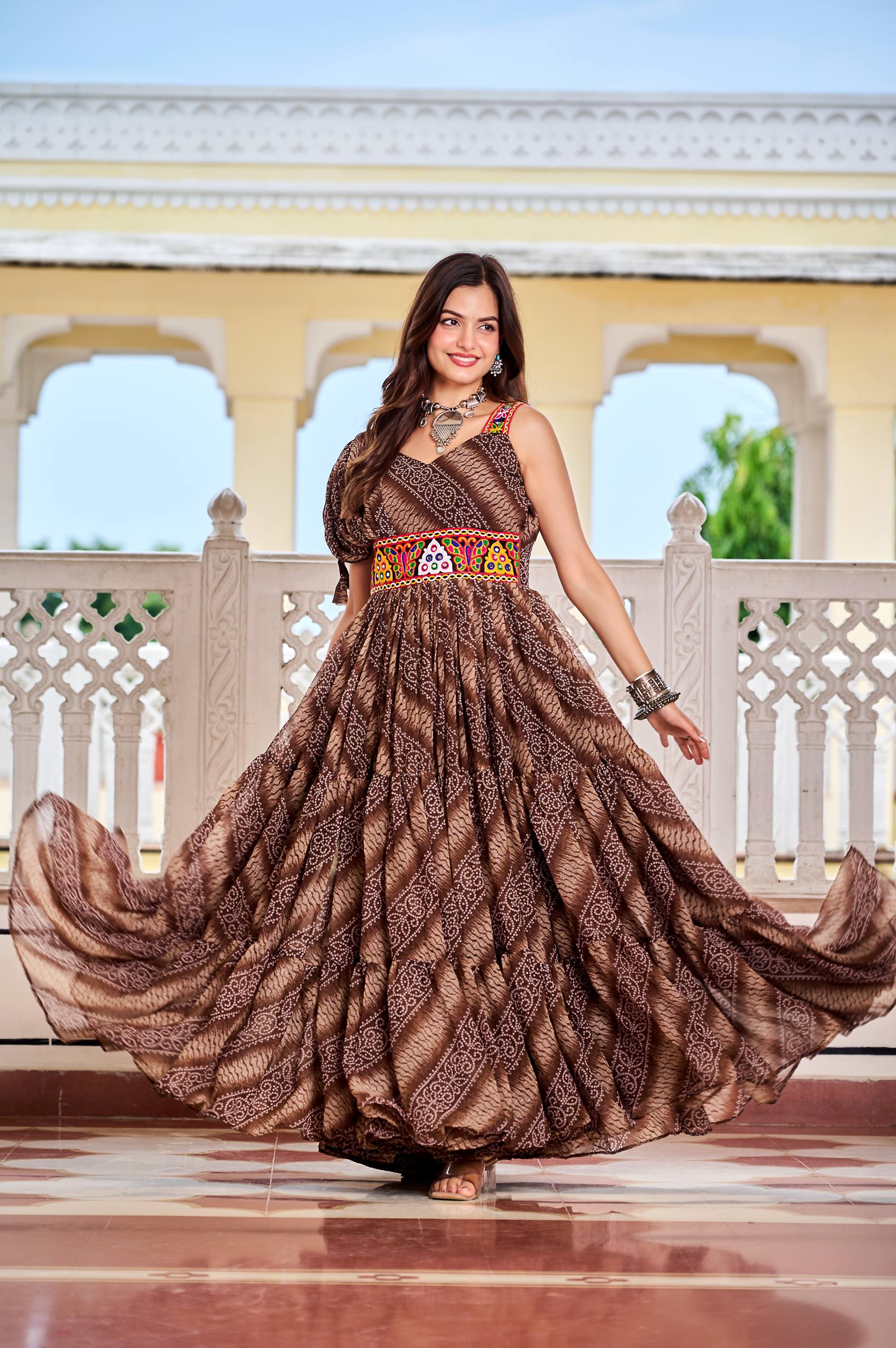 Alluring Brown Color Bandhni Gamthi Work Gown