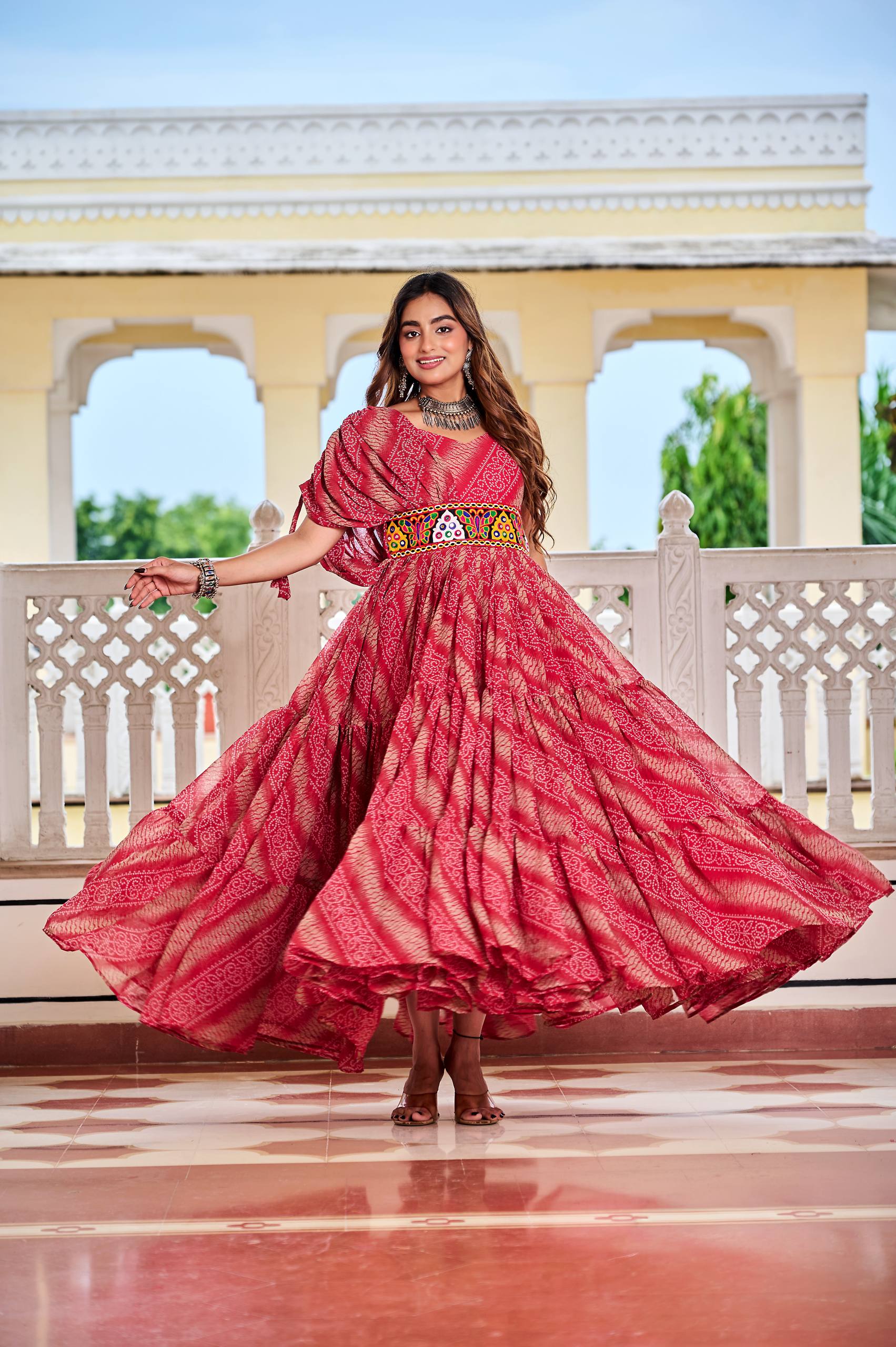 Alluring Brown Color Bandhni Gamthi Work Gown