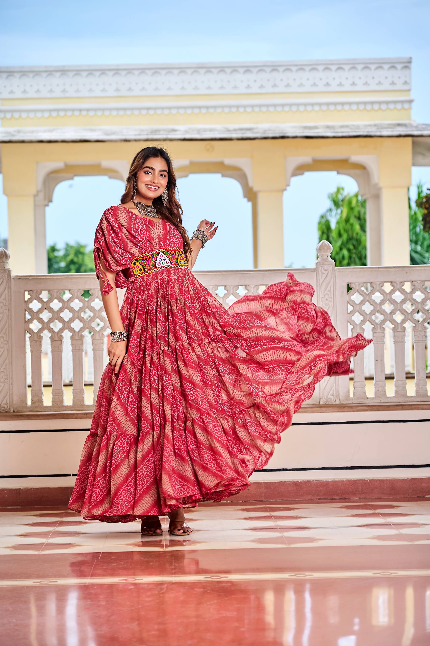 Alluring Brown Color Bandhni Gamthi Work Gown