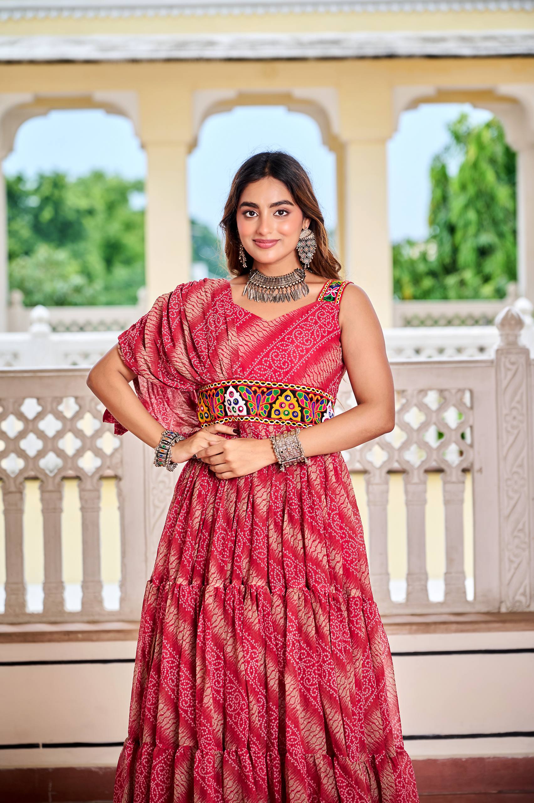Alluring Brown Color Bandhni Gamthi Work Gown