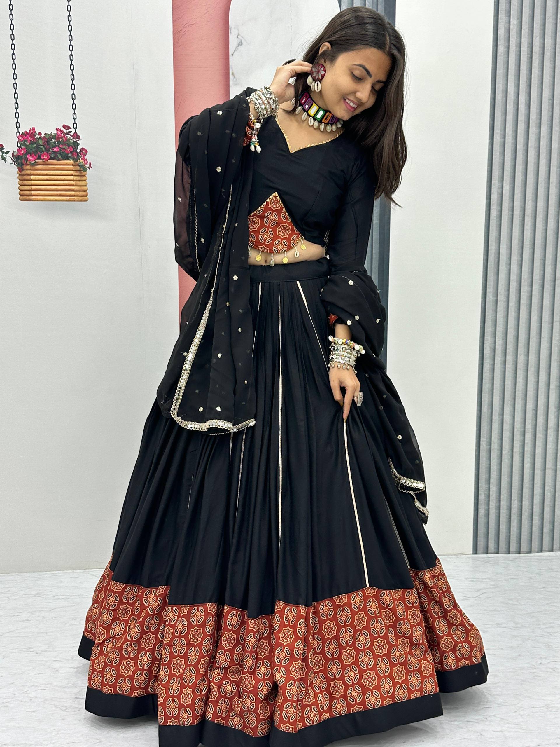 Marvelous Black Color Ajrakh Print Lehenga Choli For Navratri