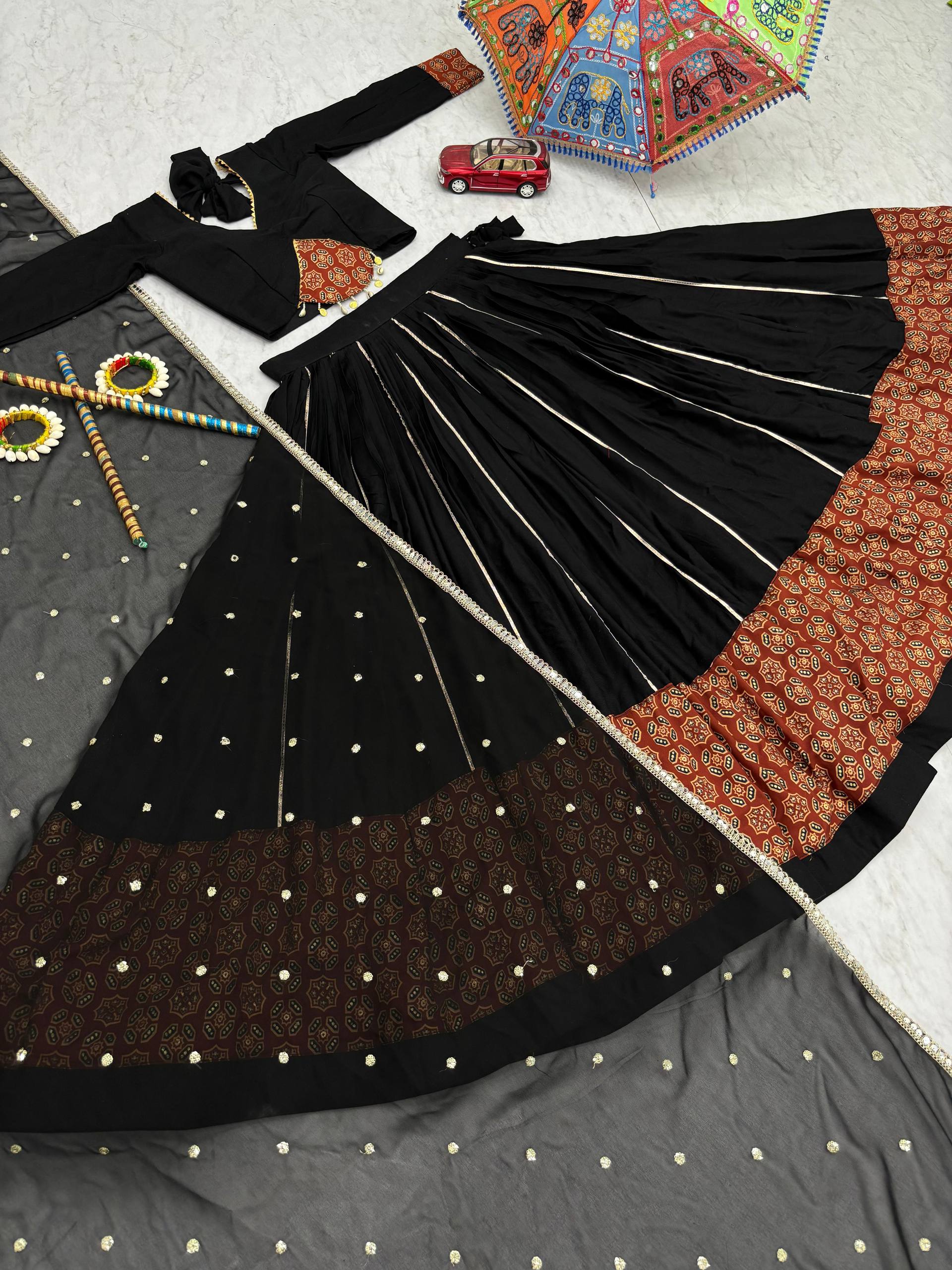 Marvelous Black Color Ajrakh Print Lehenga Choli For Navratri