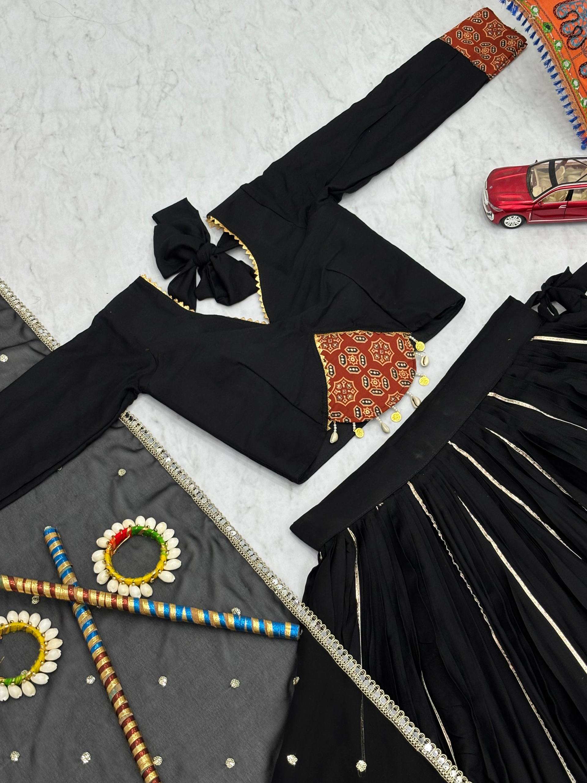 Marvelous Black Color Ajrakh Print Lehenga Choli For Navratri