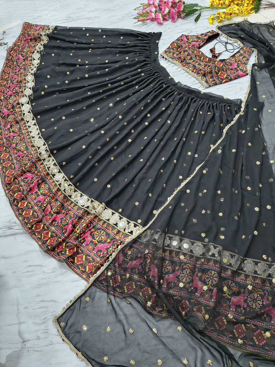Trendy Black Color Mirror Work Georgette Lehenga Choli