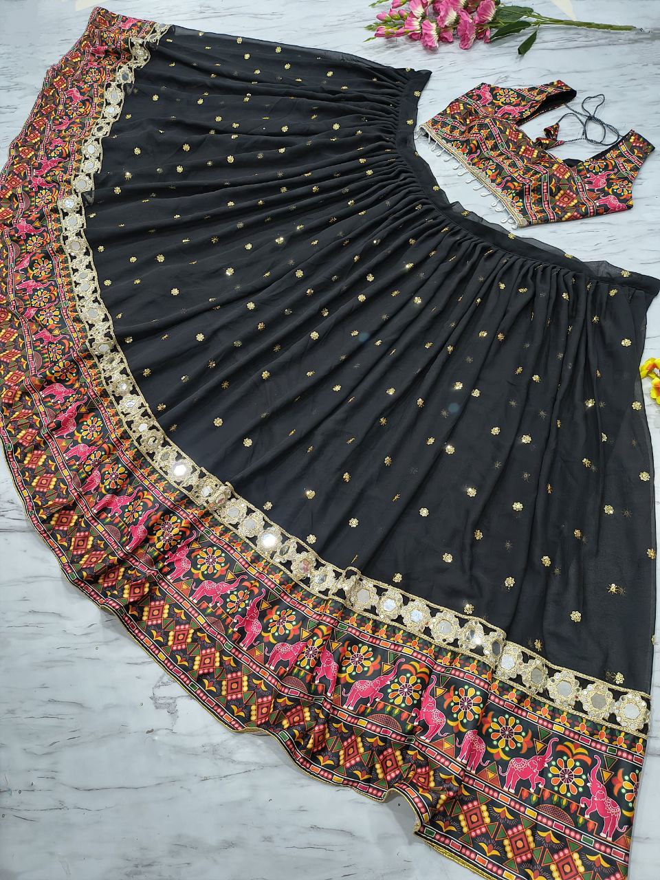 Trendy Black Color Mirror Work Georgette Lehenga Choli